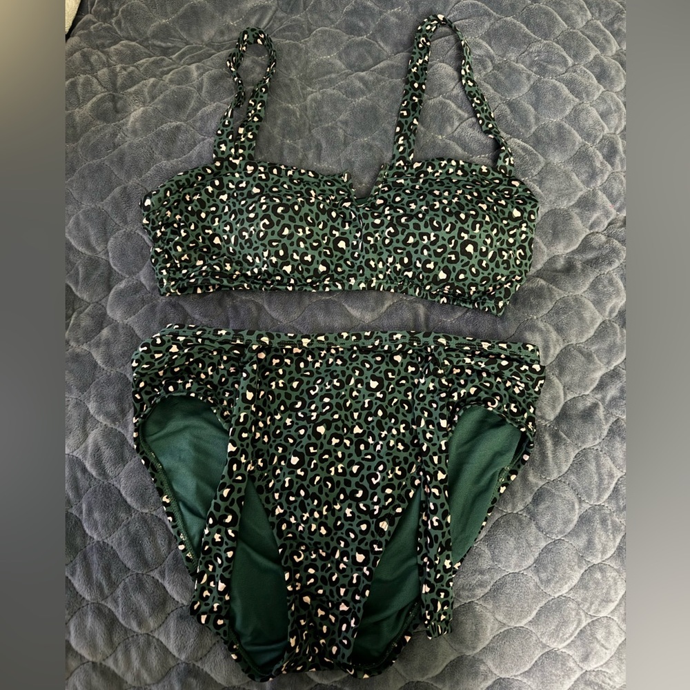Two piece swim set. Green with cheetah print. Bottoms: small Top: medium